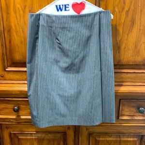 Ann Taylor size 12 women’s pencil skirt.  Side slit dry clean only.  Grey stripe